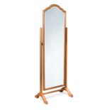 An Arts & Crafts style oak cheval mirror by J. M. Scott of Grimsby, 1937,