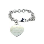 Tiffany & Co. - A silver heart tag bracelet,