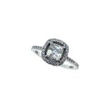 An 18ct gold diamond set halo ring,