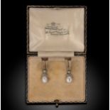 A pair of natural pearl and diamond ear pendants,