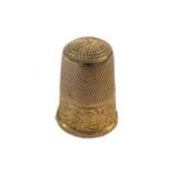 A fully hallmarked 12ct gold thimble,