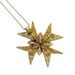 A filigree Maltese cross pendant and chain,