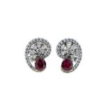 A pair of Burmese ruby and diamond swirl ear studs,