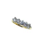 A modern 18ct gold five stone diamond ring,