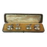 A cased set of four silver novelty menu holders, mark of Sampson Mrodan,