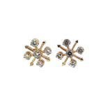 A pair of snowflake style diamond set ear studs,