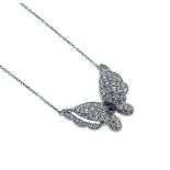 A diamond set butterfly necklace,