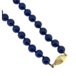 A single row of lapis lazuli beads,