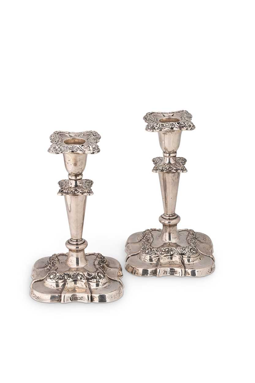 A pair of Edward VII silver library candlesticks,