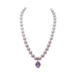 A single row of pearls with an amethyst and diamond pendant,