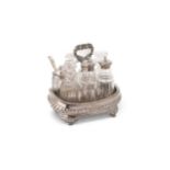 A George IV silver table cruet set and stand,