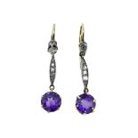 A pair of early 20th century amethyst and diamond ear pendants,