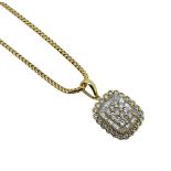 A modern diamond cluster pendant and chain,