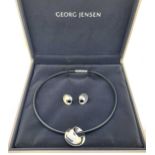 Vivianna Torun Bülow-Hübe for Georg Jensen - A silver necklace and ear stud suite,