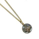 A reverse intaglio pendant and chain,