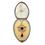 An amethyst and split pearl pendant/brooch and chain,