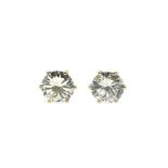 A pair of diamond solitaire ear studs,
