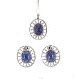 A tanzanite and diamond pendant and chain, together with matching ear studs,
