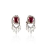 An important pair of Burmese ruby and diamond ear pendants,