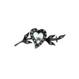 Child & Child - A diamond set heart brooch,