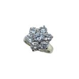 A late 20th century 18ct gold diamond cluster ring,