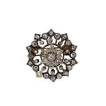 A Victorian diamond set circular brooch,