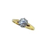 A diamond solitaire ring,