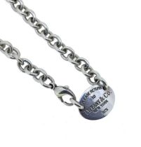Tiffany & Co. - An oval tag necklace,