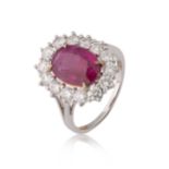 A Burmese ruby and diamond cluster ring,