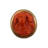 A 19th century carved coral memorial brooch,