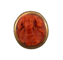 A 19th century carved coral memorial brooch,