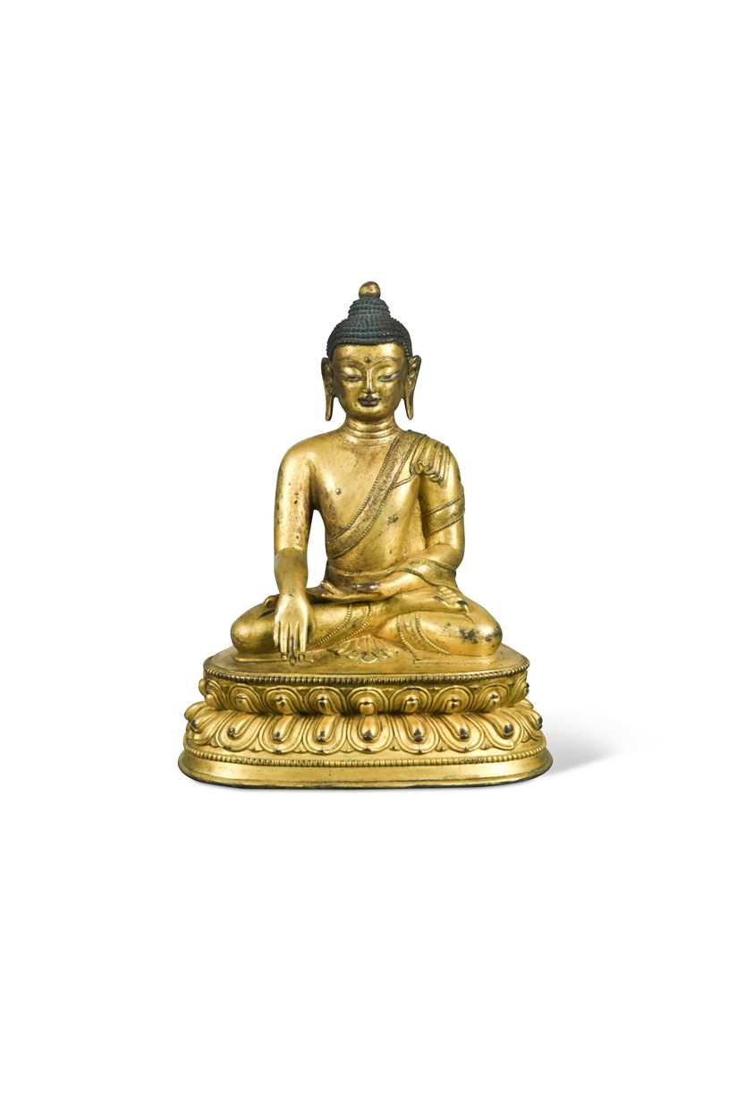 A Chinese gilt bronze figure of Buddha, Ming style,