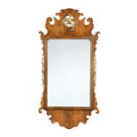 A walnut fret wall mirror, 20th century,