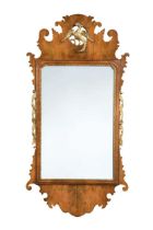 A walnut fret wall mirror, 20th century,