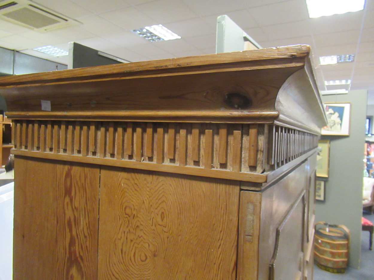 A George III style pine wardrobe, 20th century, - Image 11 of 18