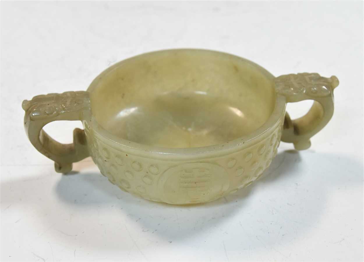 A Chinese jade tab-handled bowl in an archaic style, Qing Dynasty, 19th century, - Image 4 of 7