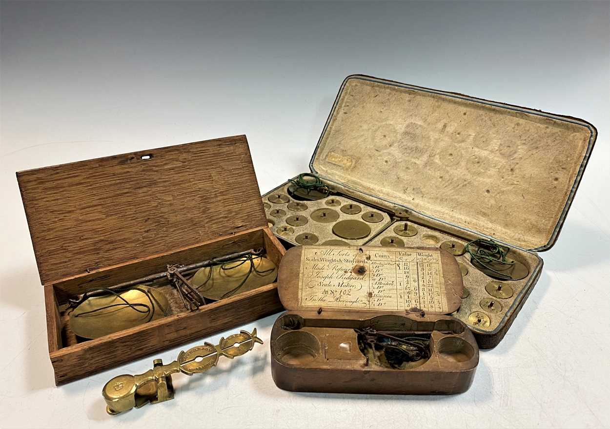 A fruitwood cased coin scale, 18th century,