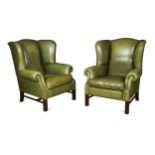 A pair of leather wingback armchairs, 20th century,