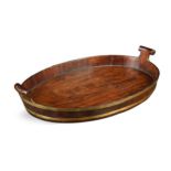 A George III mahogany and brass bound oval tray,