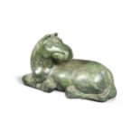 A Chinese spinach jade type recumbent horse, Ming style, 20th century,