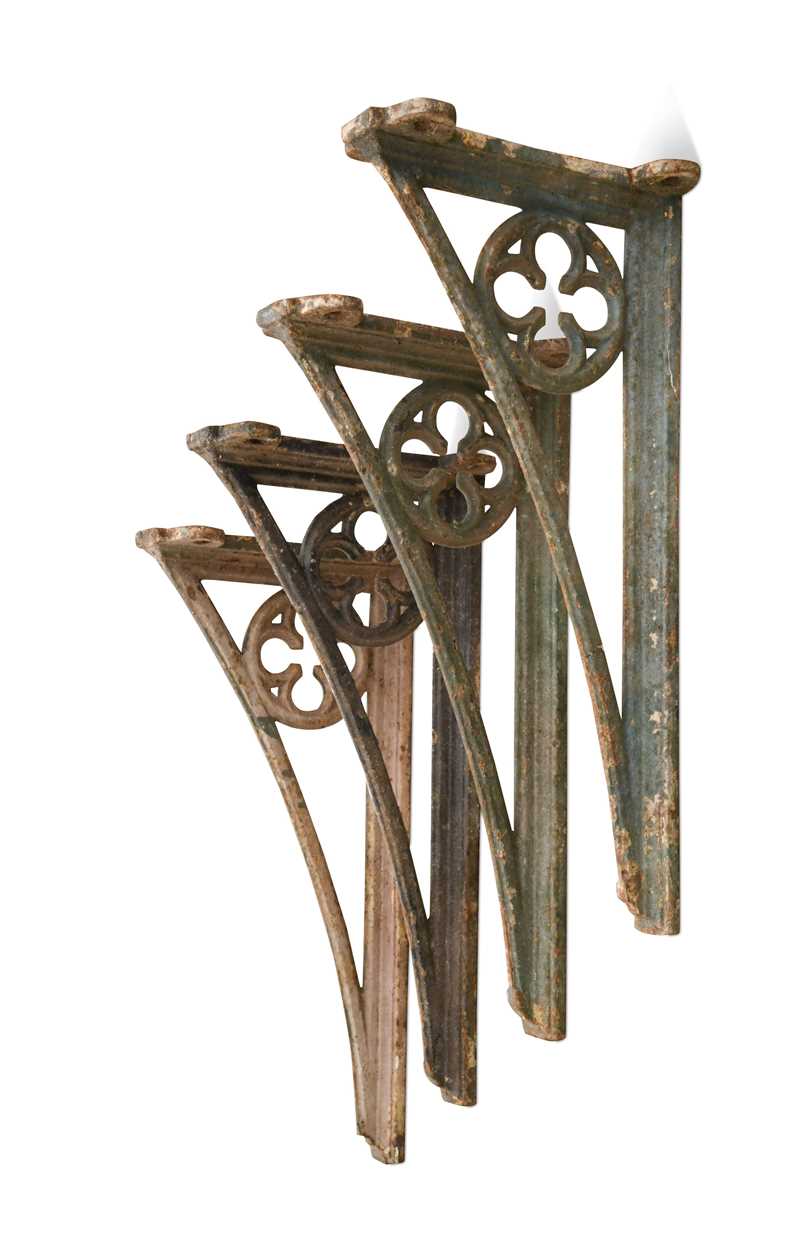 A set of four cast iron brackets, 19th century,