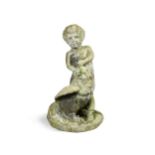 A lead garden figure of a boy struggling to hold a cockerel, early 20th century,