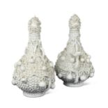A pair of Meissen schneeballen bottle vases and covers,
