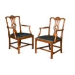 A pair of mahogany open armchairs, 19th century,