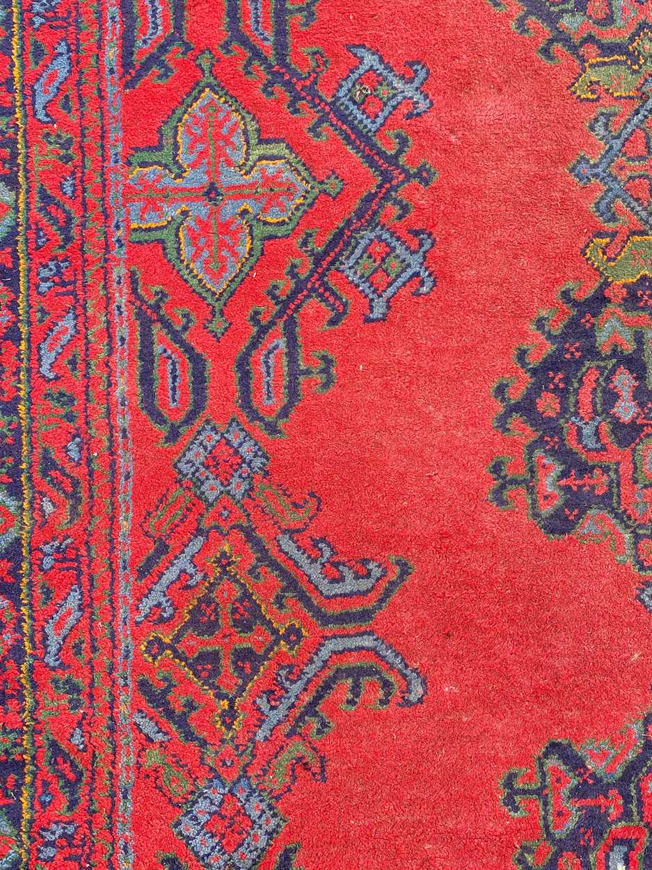 A large red ground Ushak carpet, circa 1930, - Image 7 of 9