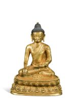 A Chinese gilt bronze figure of Buddha seated in meditation,
