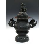 A Japanese bronze censer with dragon lid,