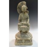 A Chinese carved white marble figure of Amitabha, Tang style, early 8th century,