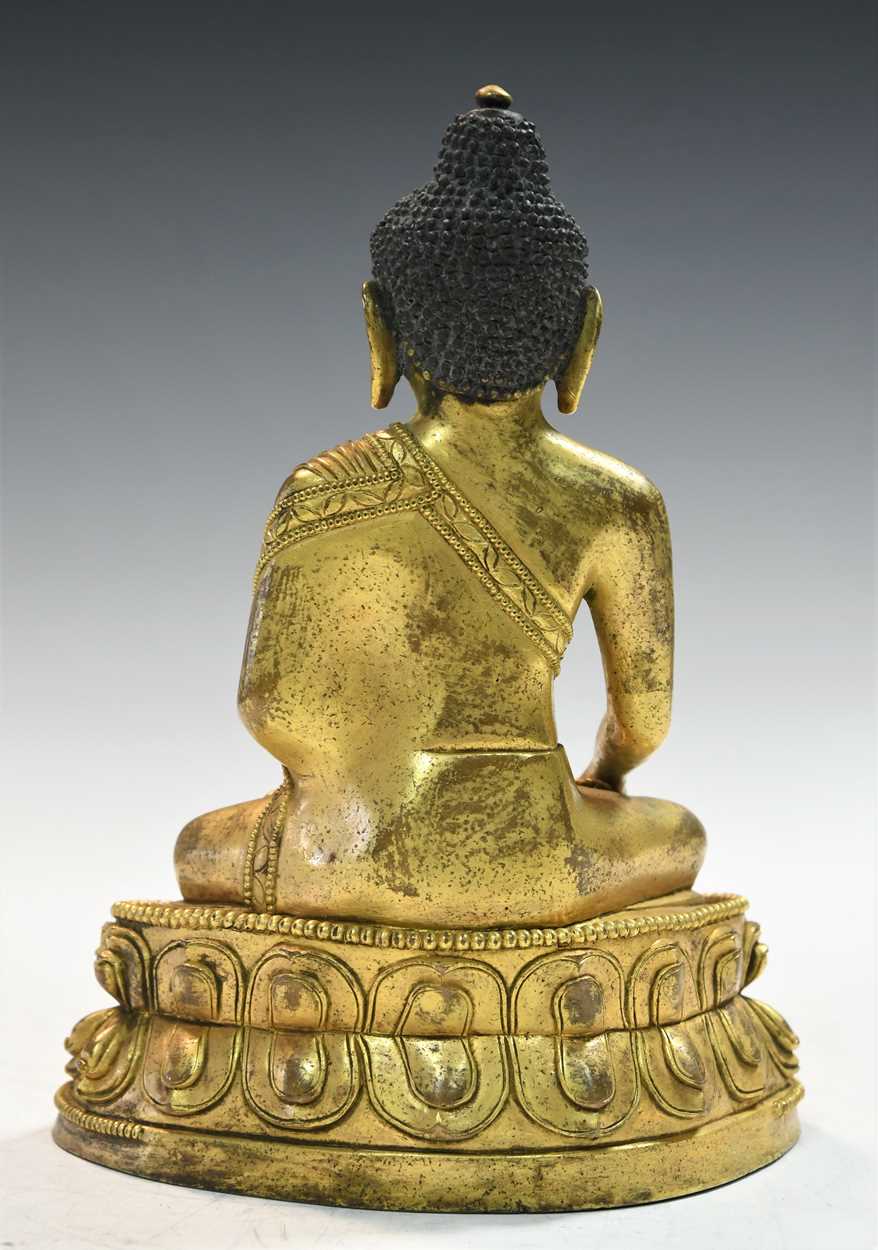 A Chinese gilt bronze figure of Buddha seated in meditation, - Image 5 of 13