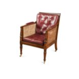 A Regency mahogany library bergere armchair,